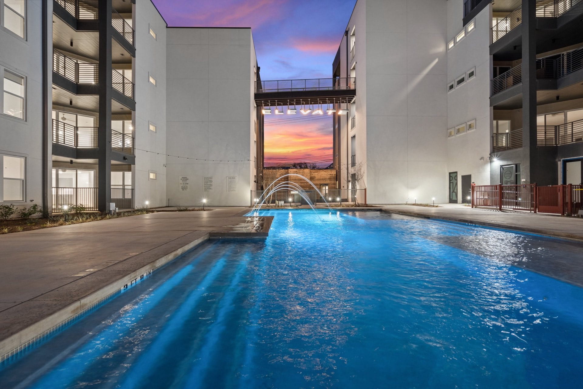 large pool in between apartment buildings